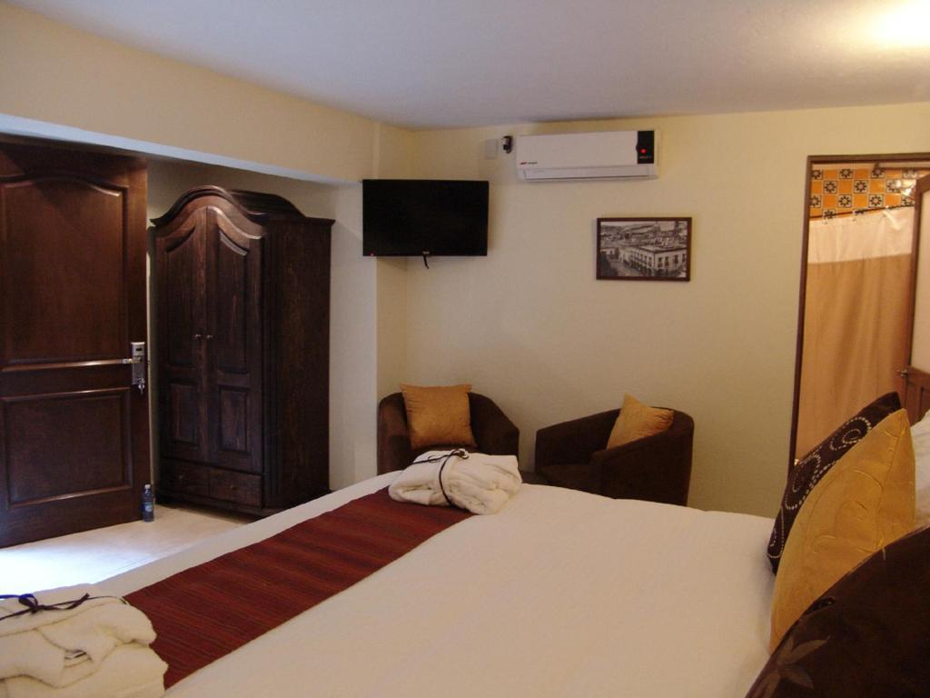 Casa Del Tio Hotel Boutique San Miguel de Allende Phòng bức ảnh A room at the hotel